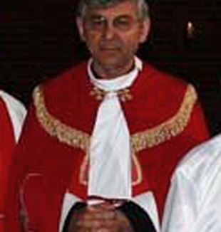 Monsignor Garmou.