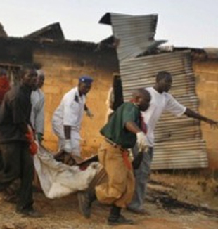 Un villaggio vicino a Jos, dopo l'attacco. 