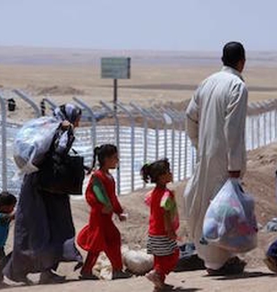 Cristiani iracheni in fuga dal loro Paese.
