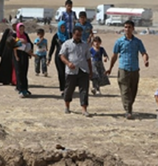 Cristiani in fuga da Mosul.